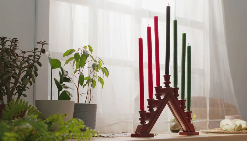 kwanzaa candles by the window